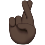 crossed fingers: dark skin tone — Apple