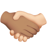 Handshake: Medium Skin Tone, Light Skin Tone, the previous design