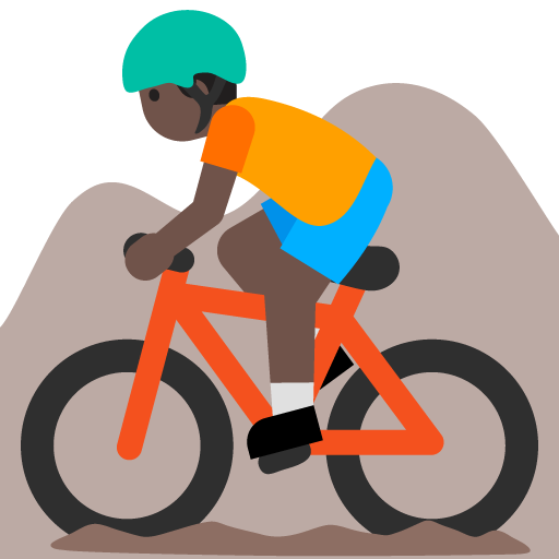 Person Mountain Biking: Dark Skin Tone, the previous design