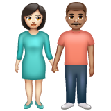 Woman and Man Holding Hands: Light Skin Tone, Medium Skin Tone, the design in this release