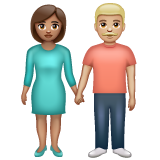 Woman and Man Holding Hands: Medium Skin Tone, Medium-Light Skin Tone, the design in this release