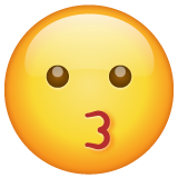 faccina che bacia as rendered by WhatsApp
