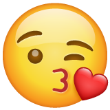 face blowing a kiss as rendered by WhatsApp